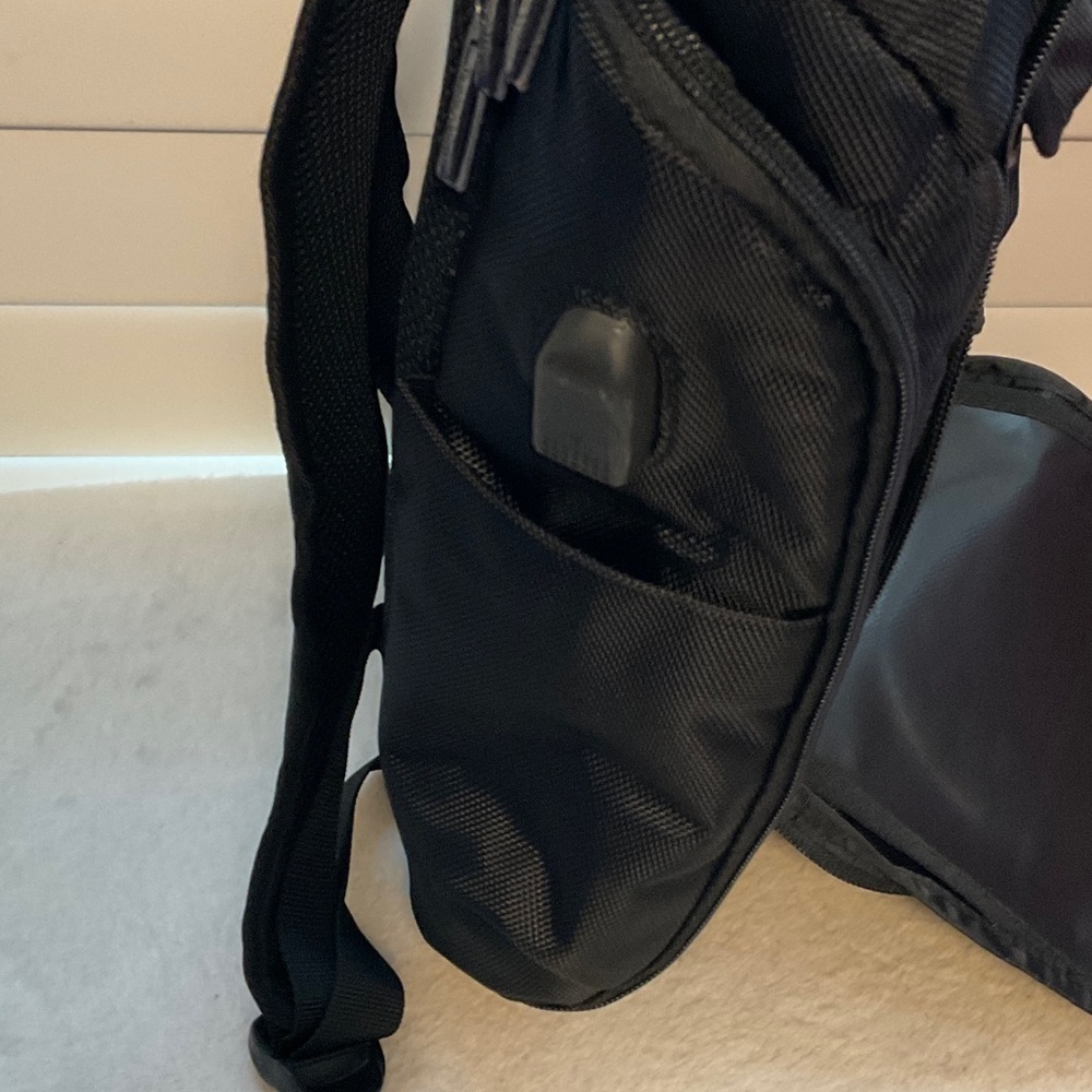 Men's Black Backpack with Colorful Wheel Design - Picture 5 of 7